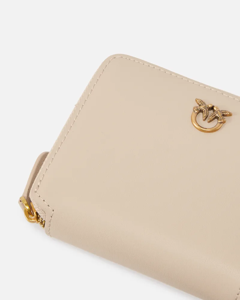 TAYLOR ZIP AROUND MEDIO
